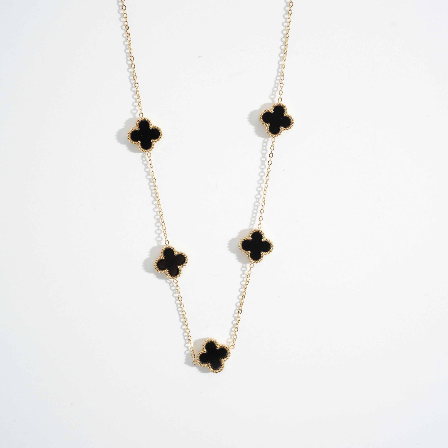 Black Clover Necklace – close-up detail of design | Magnus