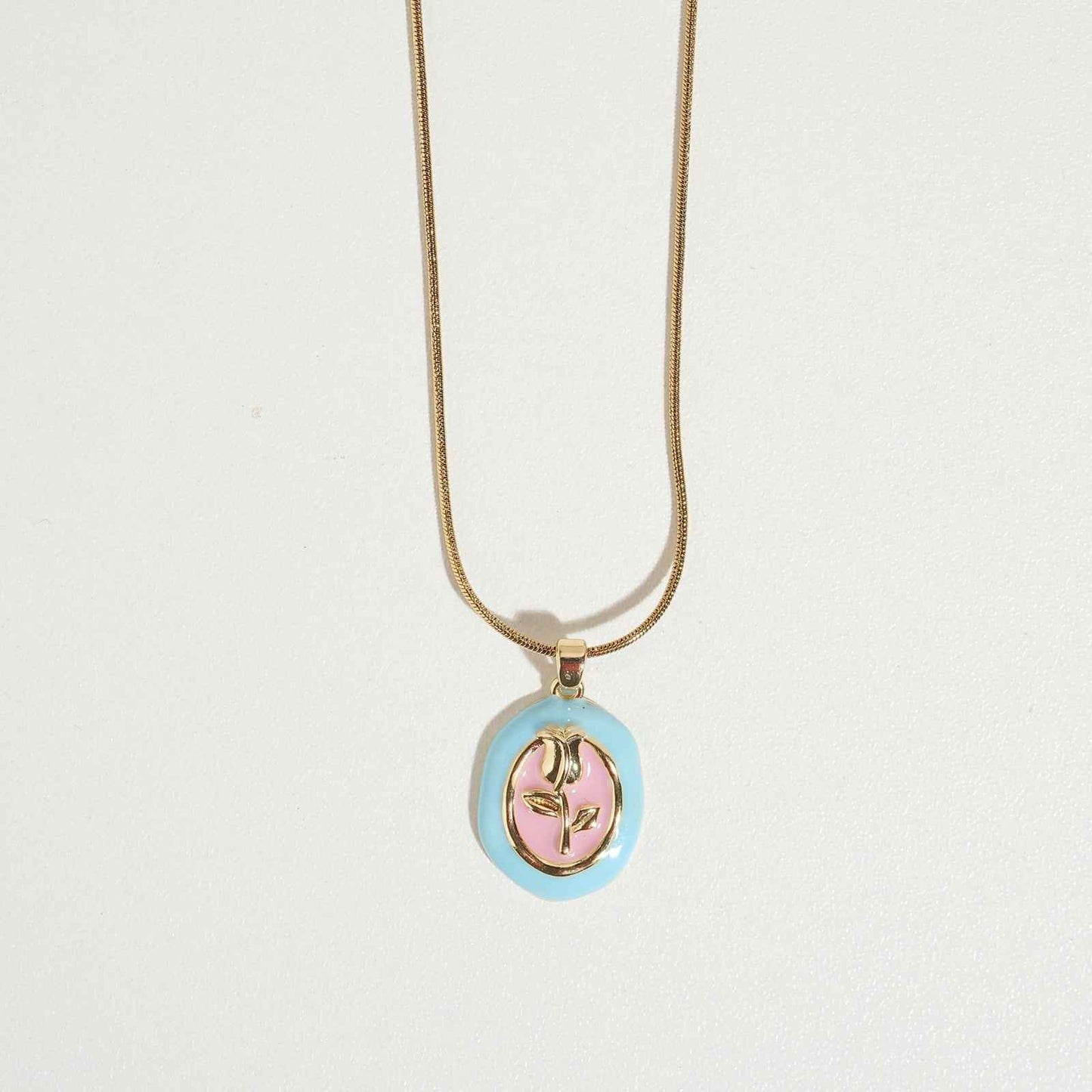 Tulip Carved Necklace – Floral tulip pendant necklace for women, gold-tone jewelry pendant with pastel enamel design. Delicate, trendy necklace for women’s fashion.