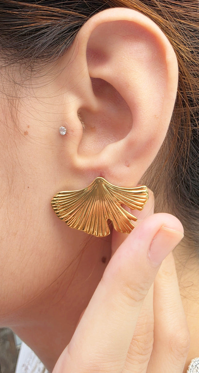 Magnus statement earrings collection with cuff-inspired and hoop-inspired designs
