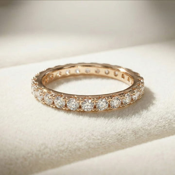 Rose gold eternity ring for women with cubic zirconia stones for a bold statement.
