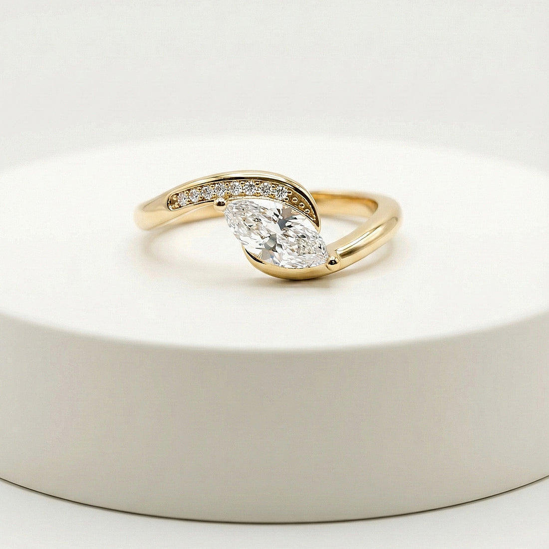 elegant statement ring for women with marquise center stone and pavé split-shank design