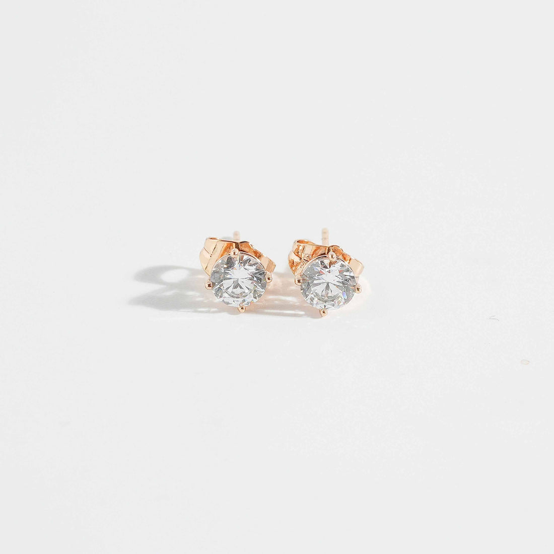Magnus Solitaire Crystal Studs clear single crystal solitaire stud earrings for women Pakistan