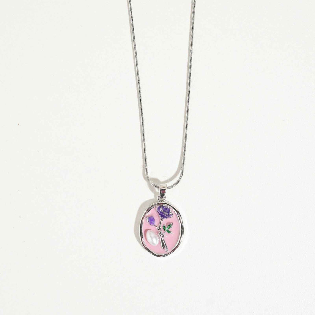 Silver-tone pendant necklace for women with pink and lavender floral design, elegant fashion accessory for special occasions and gifting.