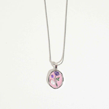 Silver-tone pendant necklace for women with pink and lavender floral design, elegant fashion accessory for special occasions and gifting.