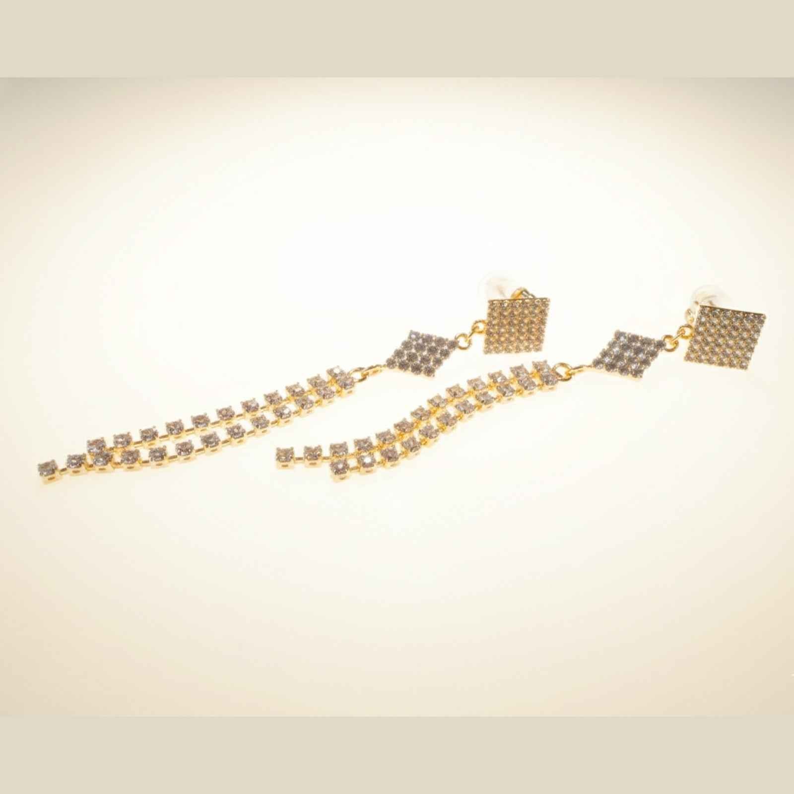 Lustara Dangle Earrings – close-up detail of design | Magnus