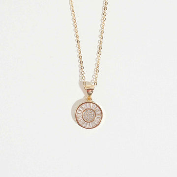 Celestial Sphere Necklace by Magnus, women’s pendant necklace with round halo-style clear stone design, gold-tone chain, zircon necklace style in Pakistan